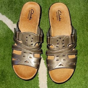 Brown Clarks bendable sandals